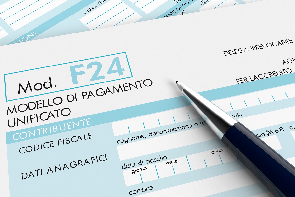 close up view of F24 form for italian taxes, with a pen (3d render)